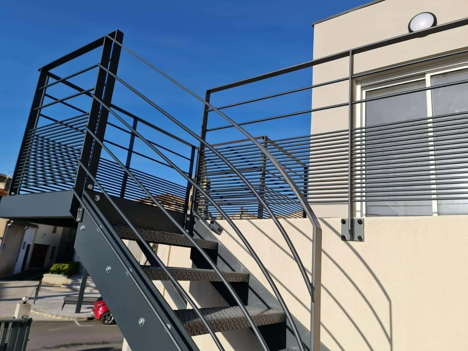 Balustrade balcon fer forgé volutes traditionnelles Limoux