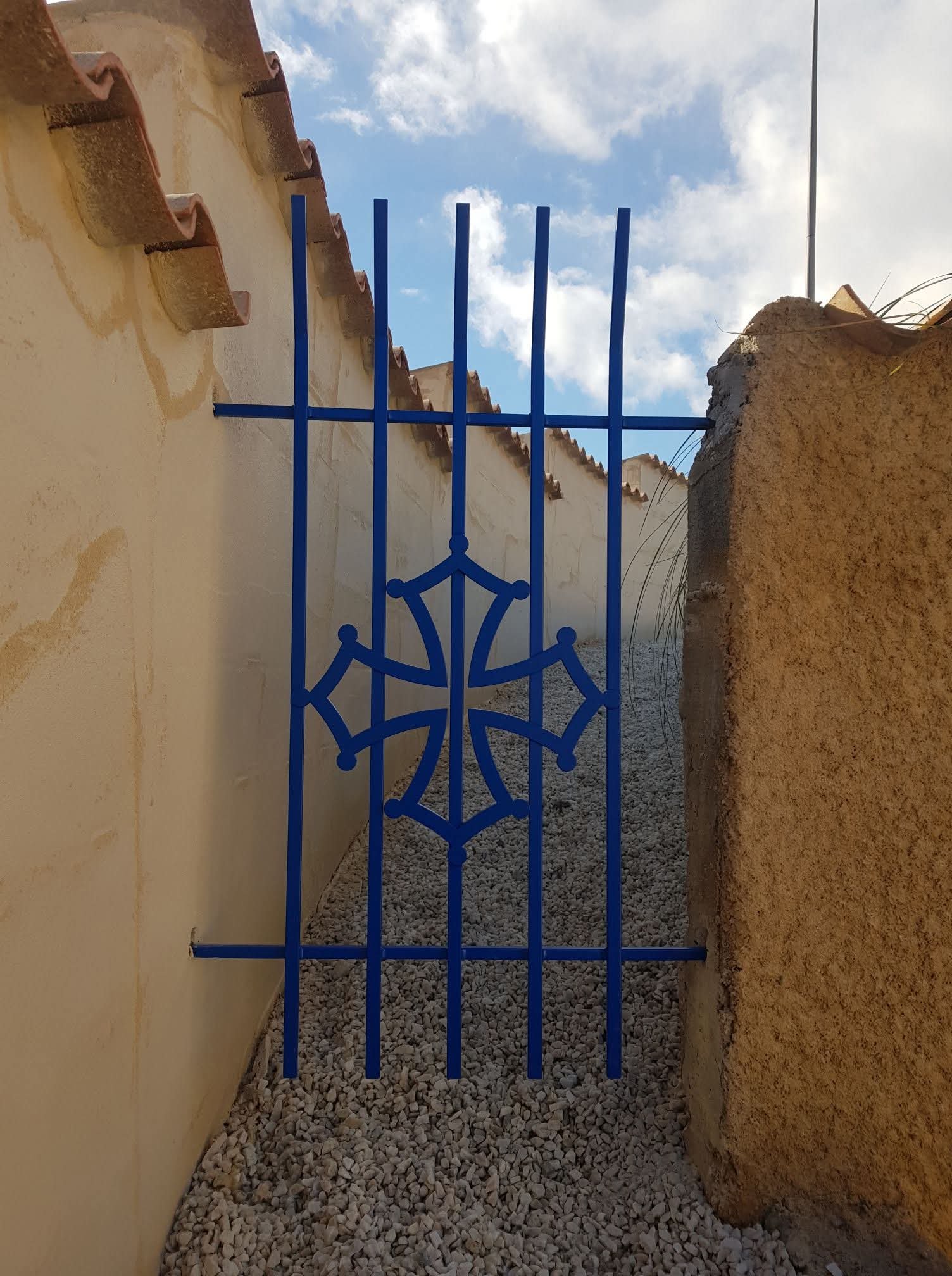 Protection fenêtre rez-de-chaussée style ferrailleur d'art